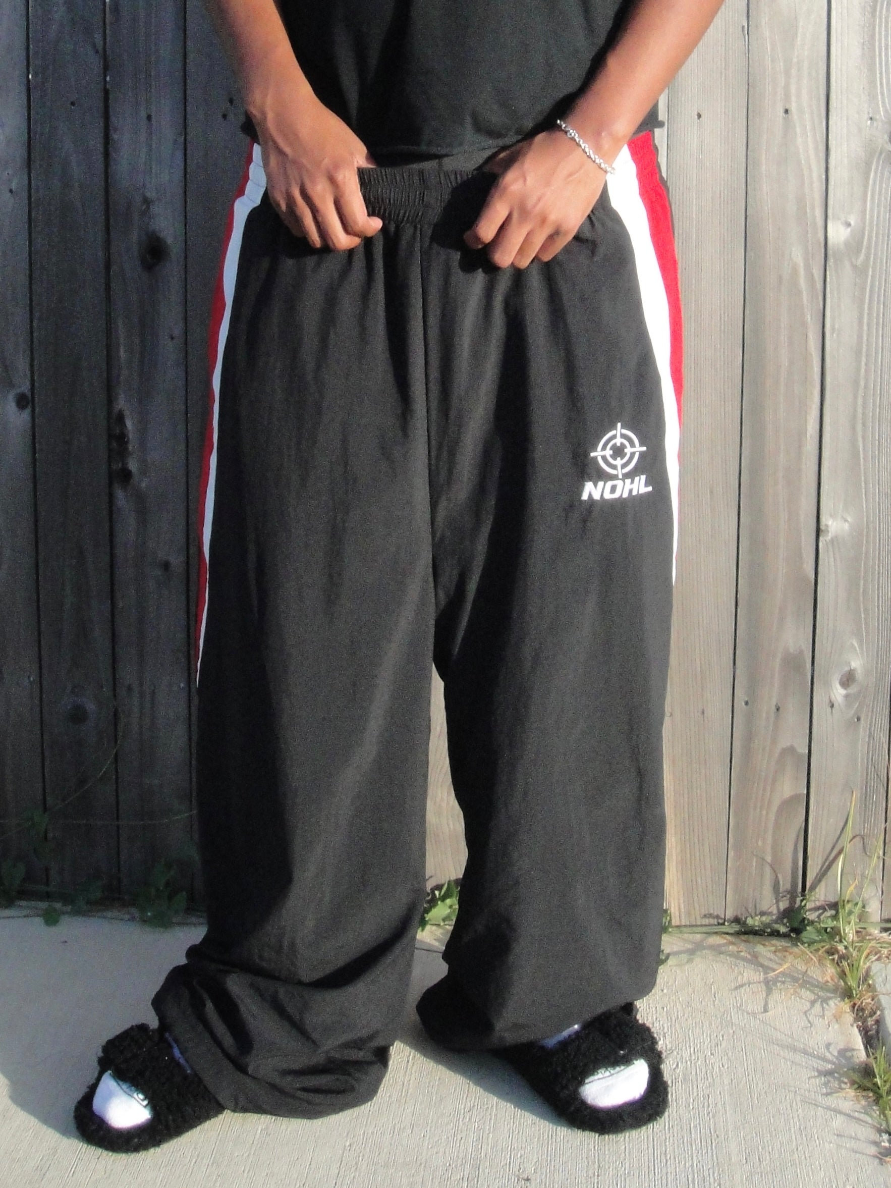 Paneled crosshair trackpants